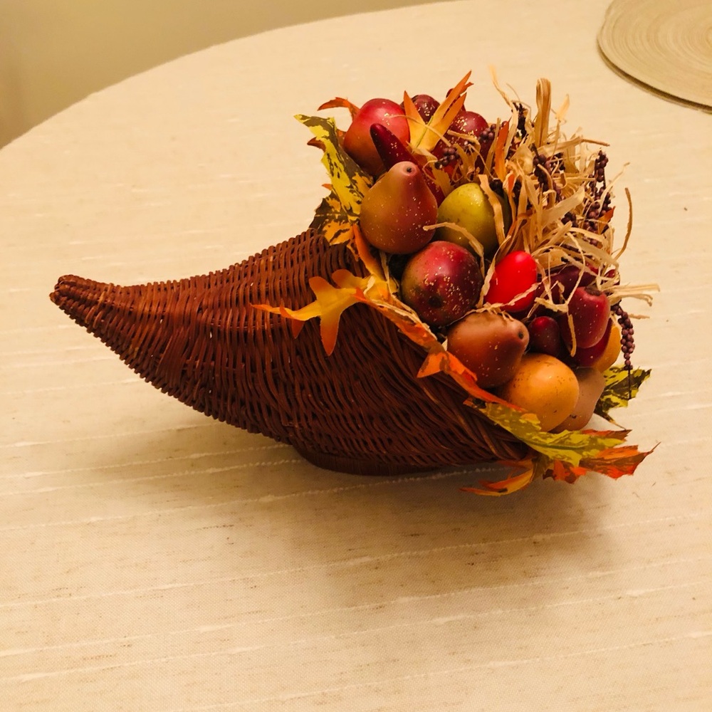 Thanksgiving cornucopia filled with fruit and berries
